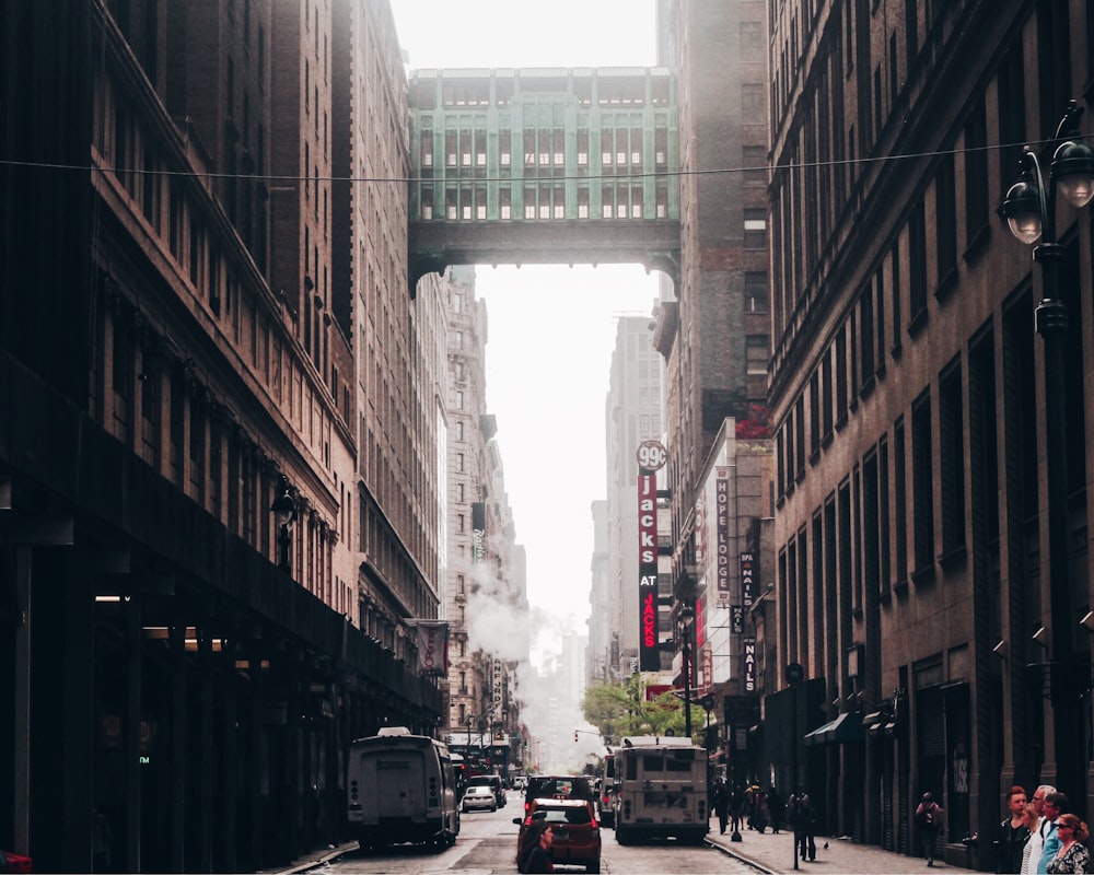 concrete road at middle of high rise buildings