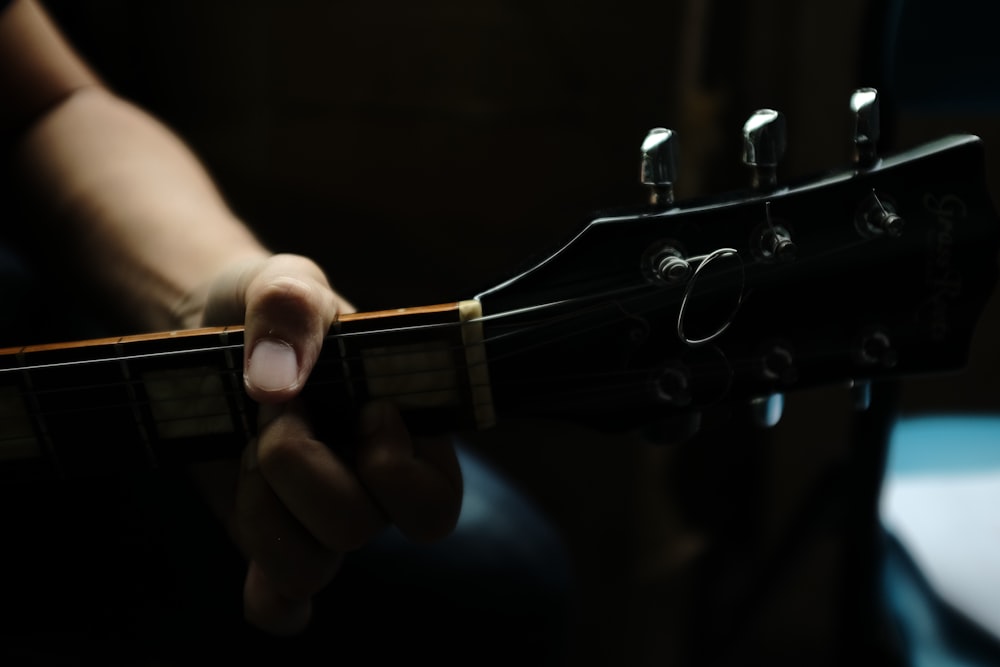 person playing guitar