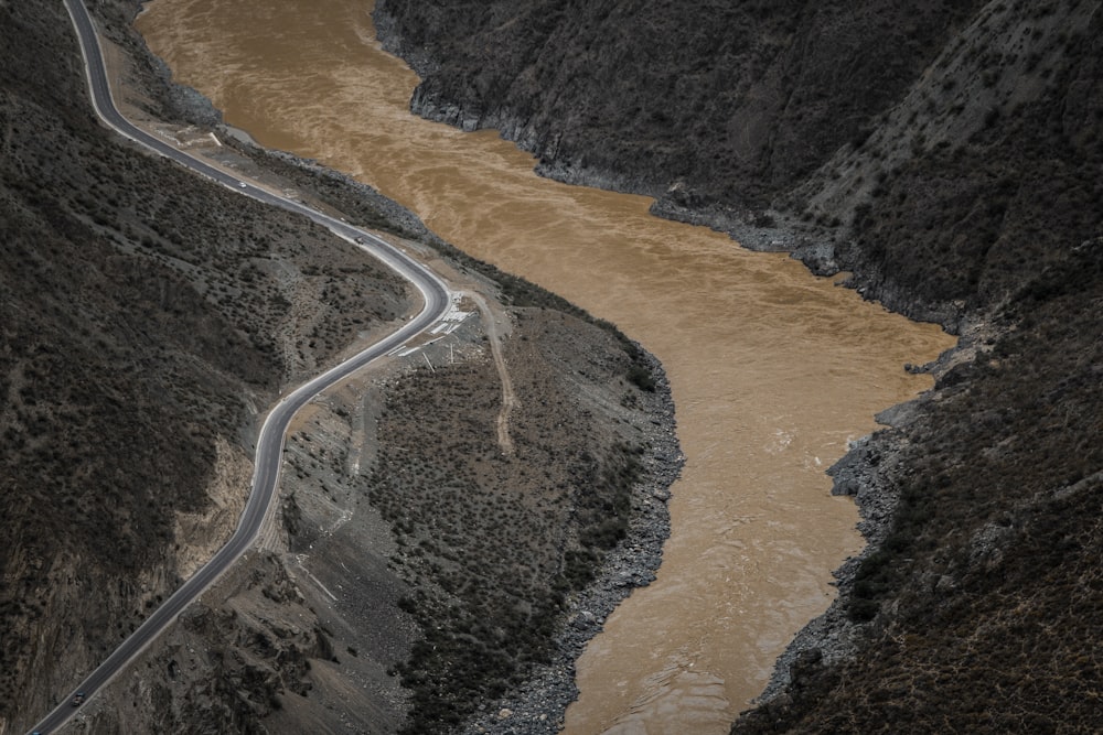 aerial view of river near concrete road