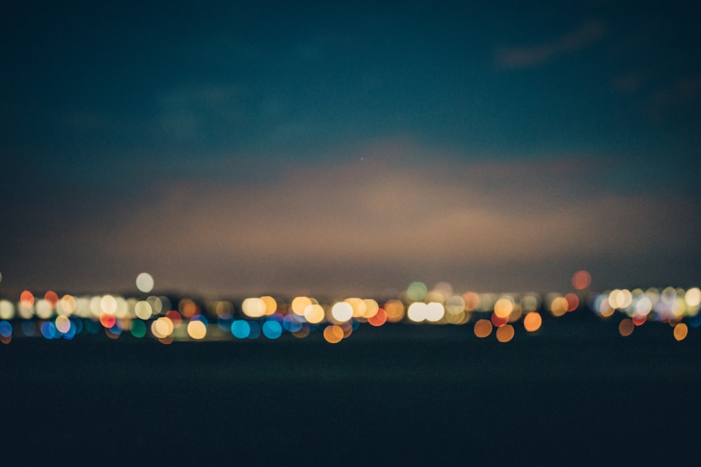 a blurry photo of a city at night