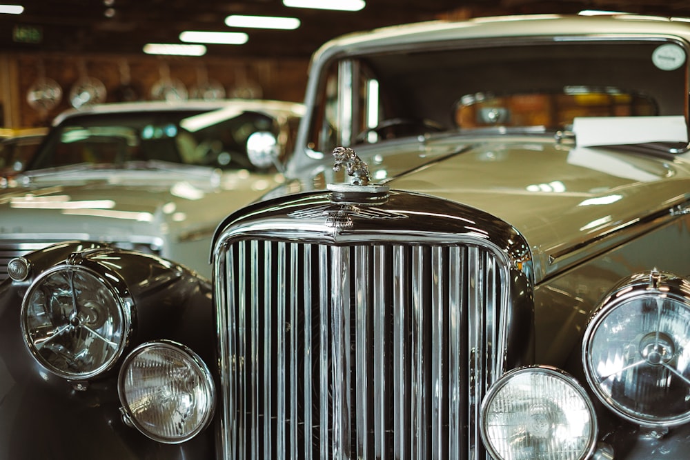 brown and gray classic car inside room with lights turned on