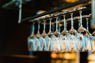 piled wine glass set hanging
