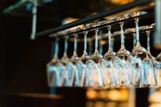 piled wine glass set hanging