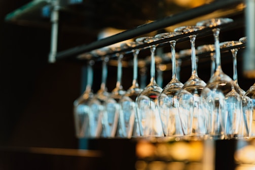piled wine glass set hanging