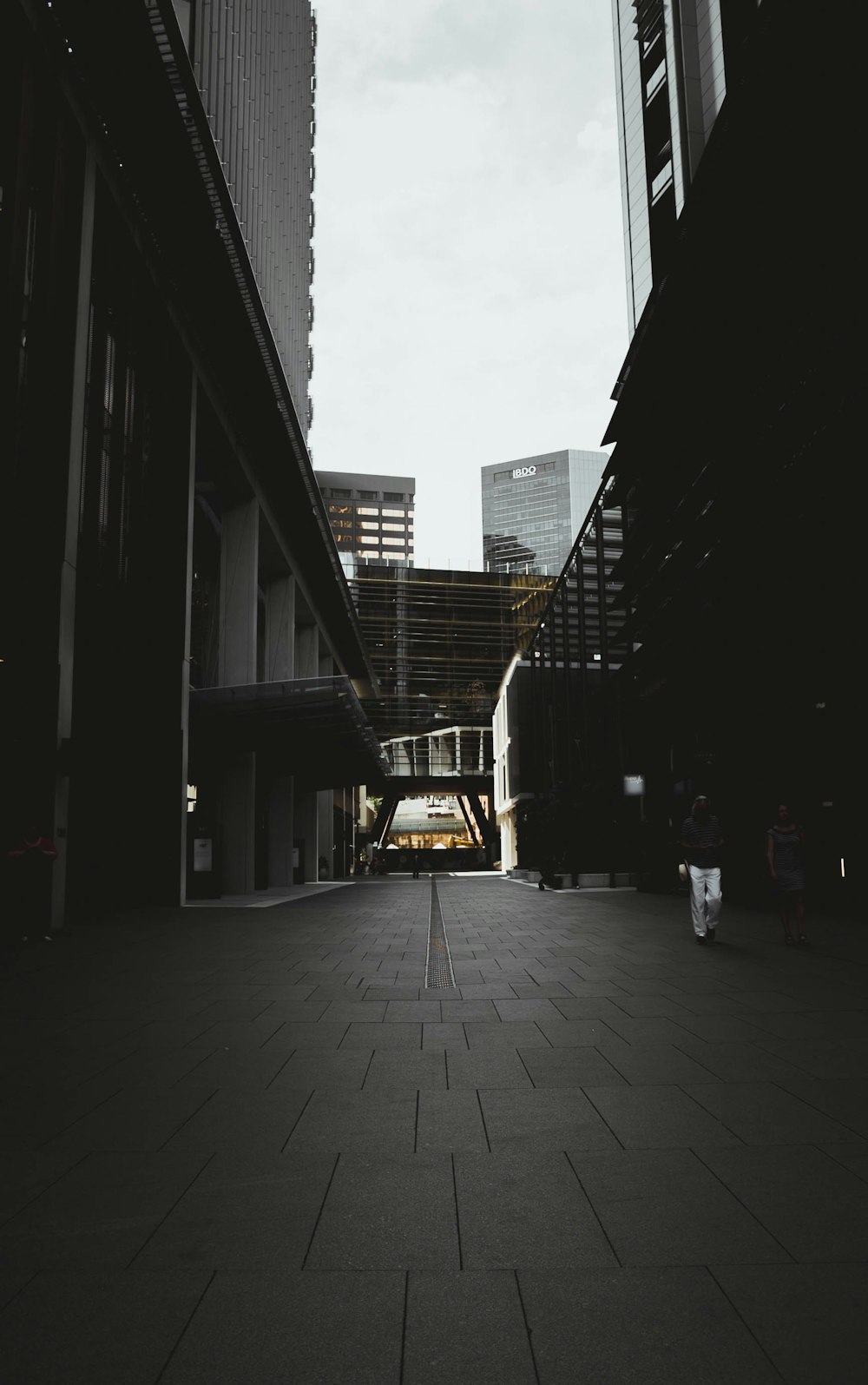 man's eye view of city pathway during daytime