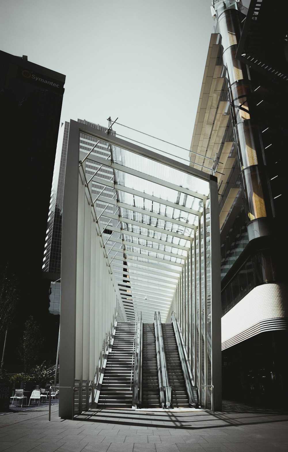 escalator outside between buildings
