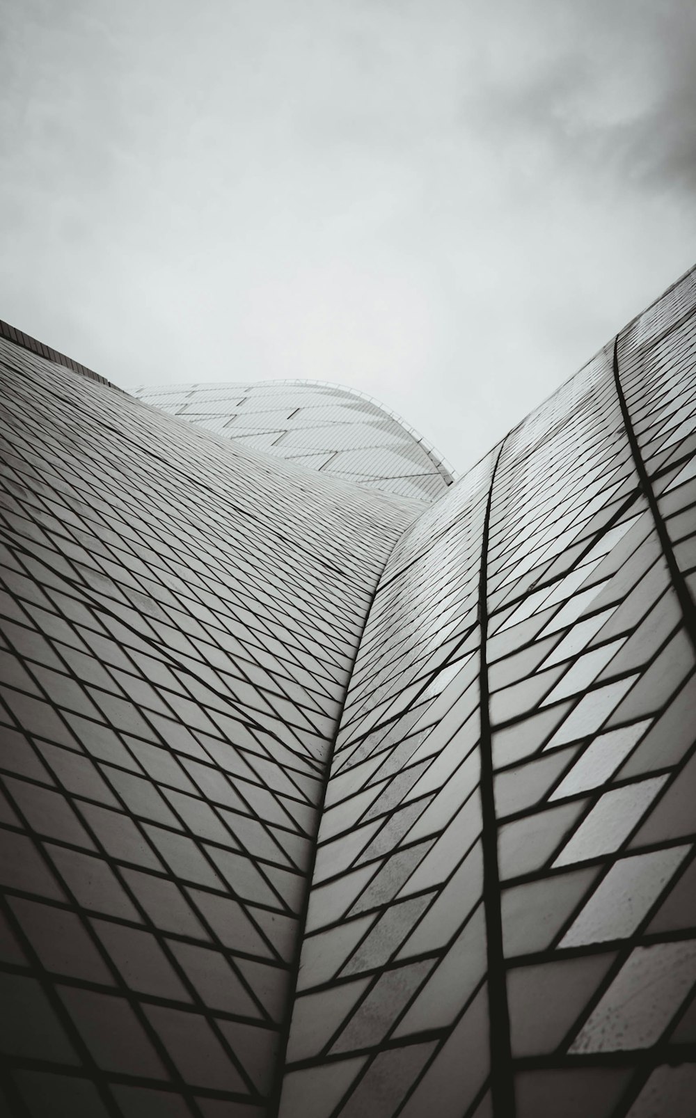 grayscale photography of black and white building low angle photography