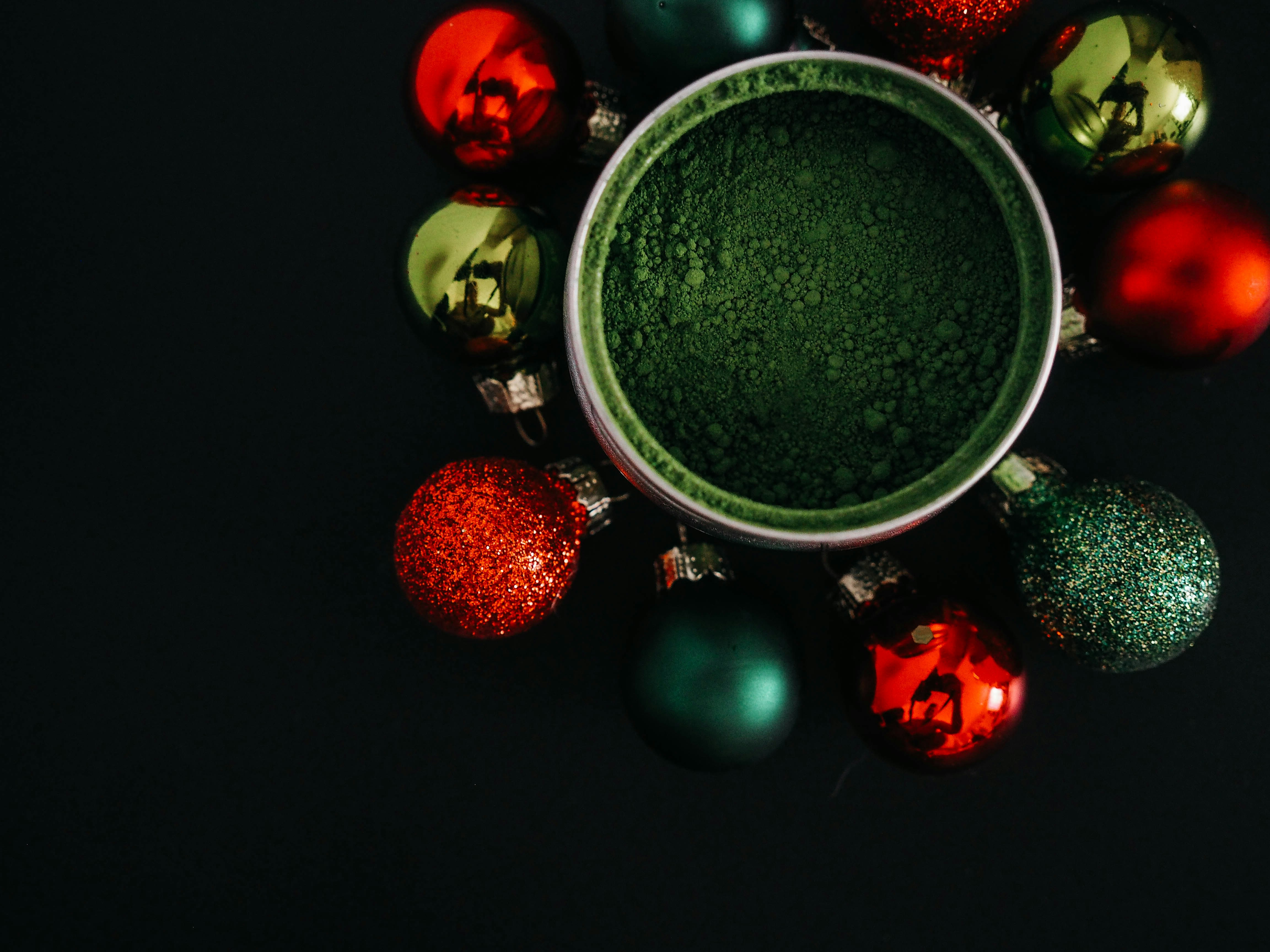 assorted-color christmas ornaments ornaments teams background