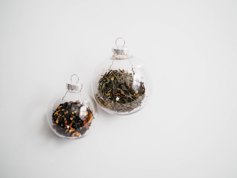 two clear glass baubles