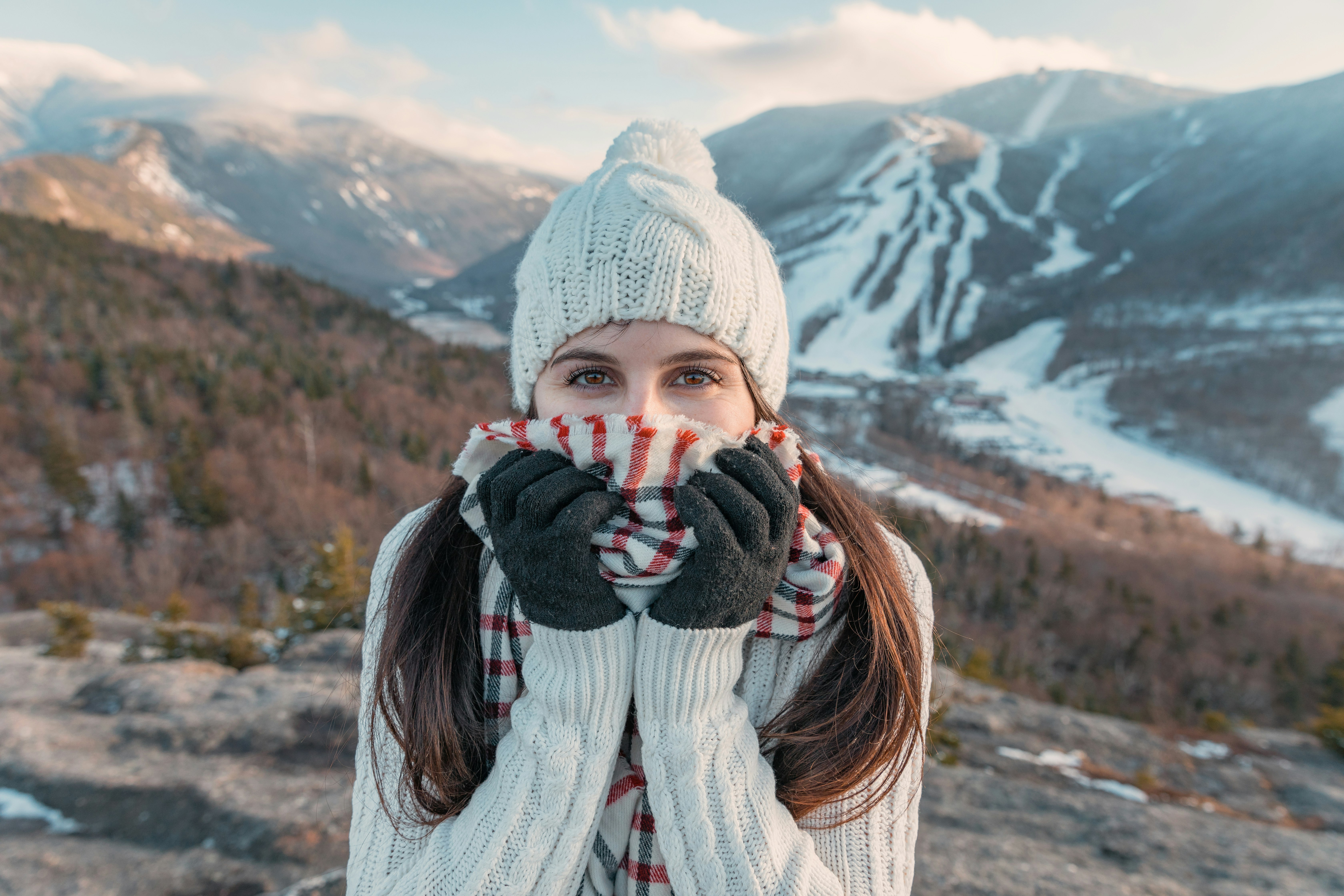 woman standing on mountain during daytime