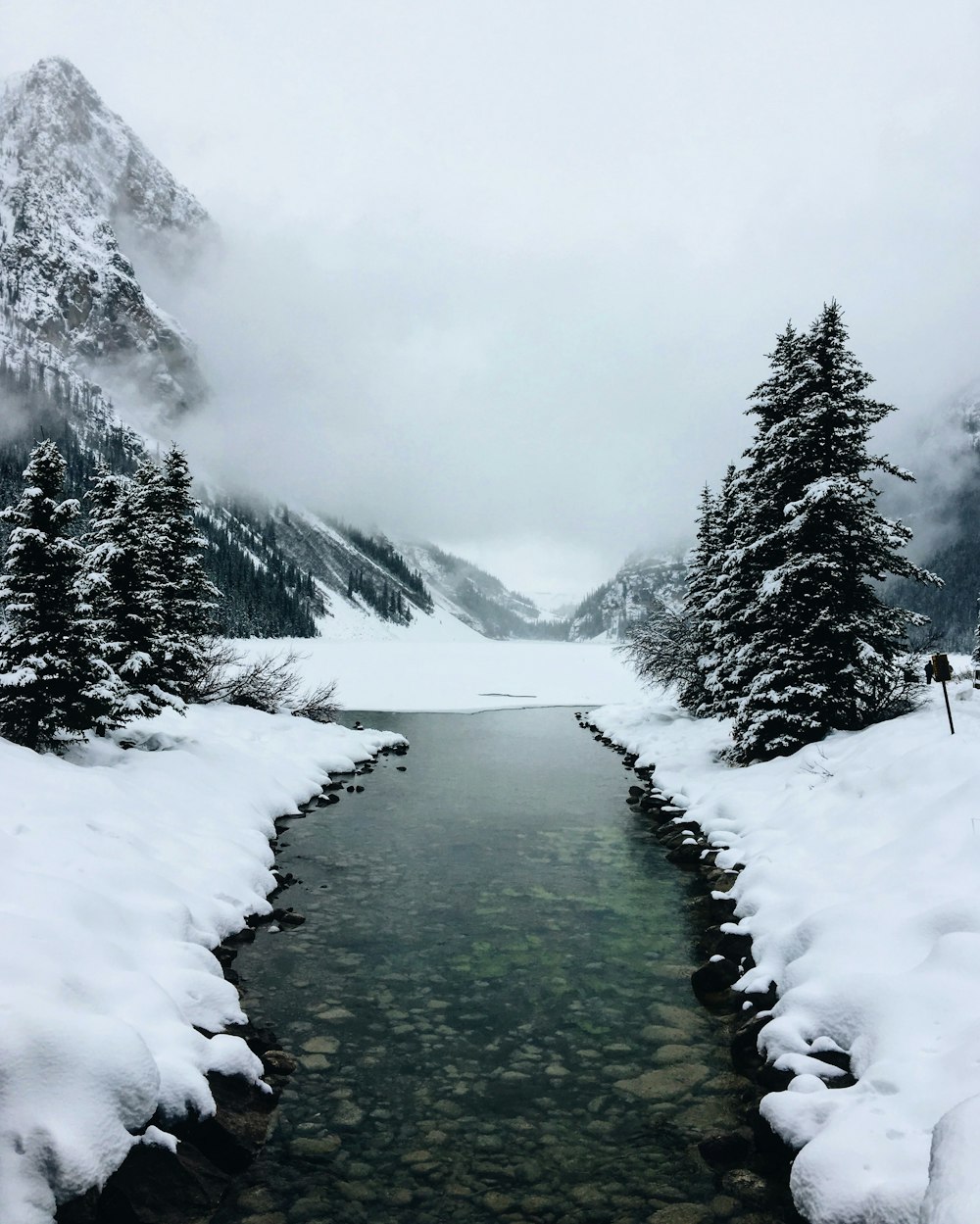 river at glacier mountain with fogs