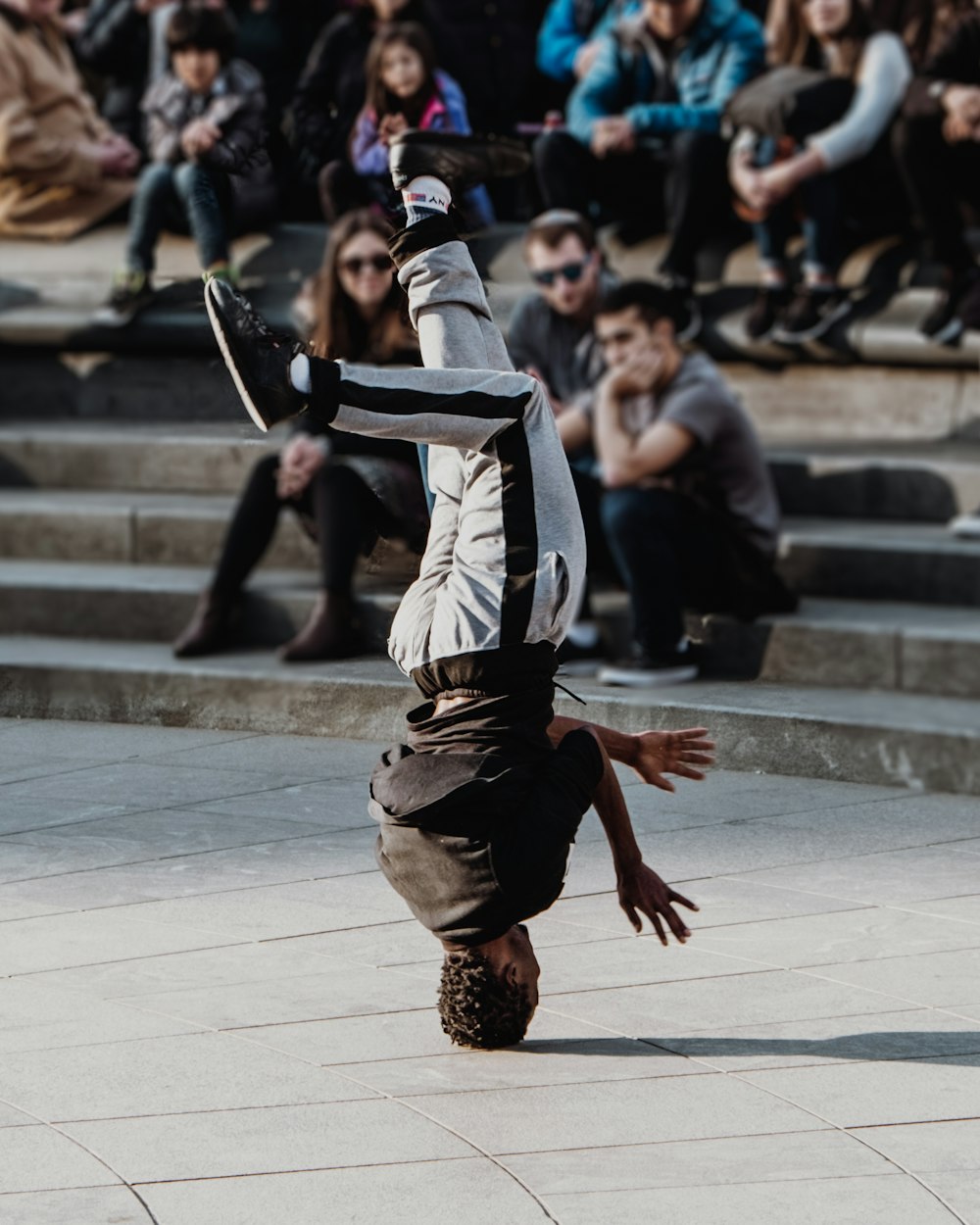 Man doing head spin on park during daytime photo – Free Street photography  Image on Unsplash