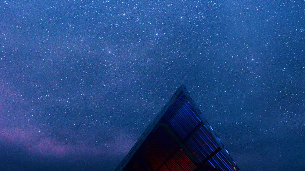 blue roof under blue sky during night time