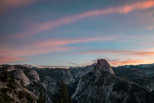 snow-capped mountain during golden hour in Yosemite National Park, Half Dome United States