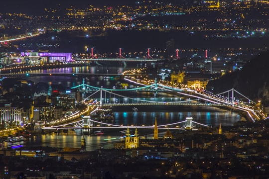 aerial photo of lighted city in Hármashatárhegy Hungary