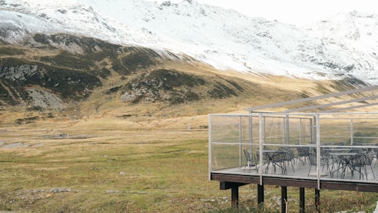 chairs near mountain photo in Lombardy Italy