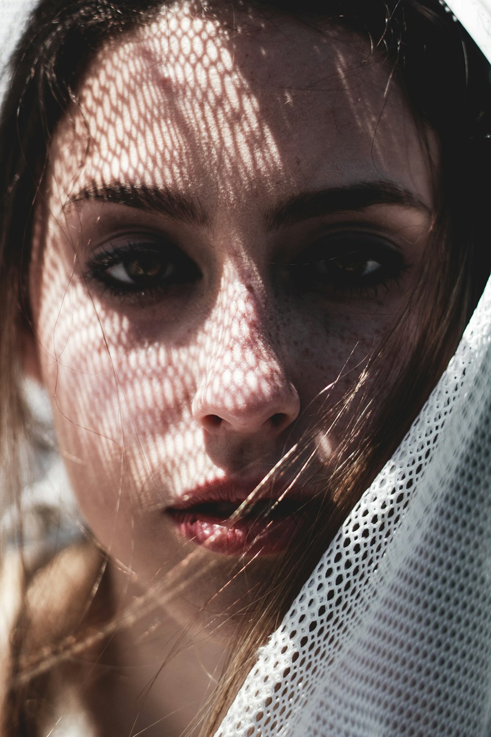  a woman with a veil on her head