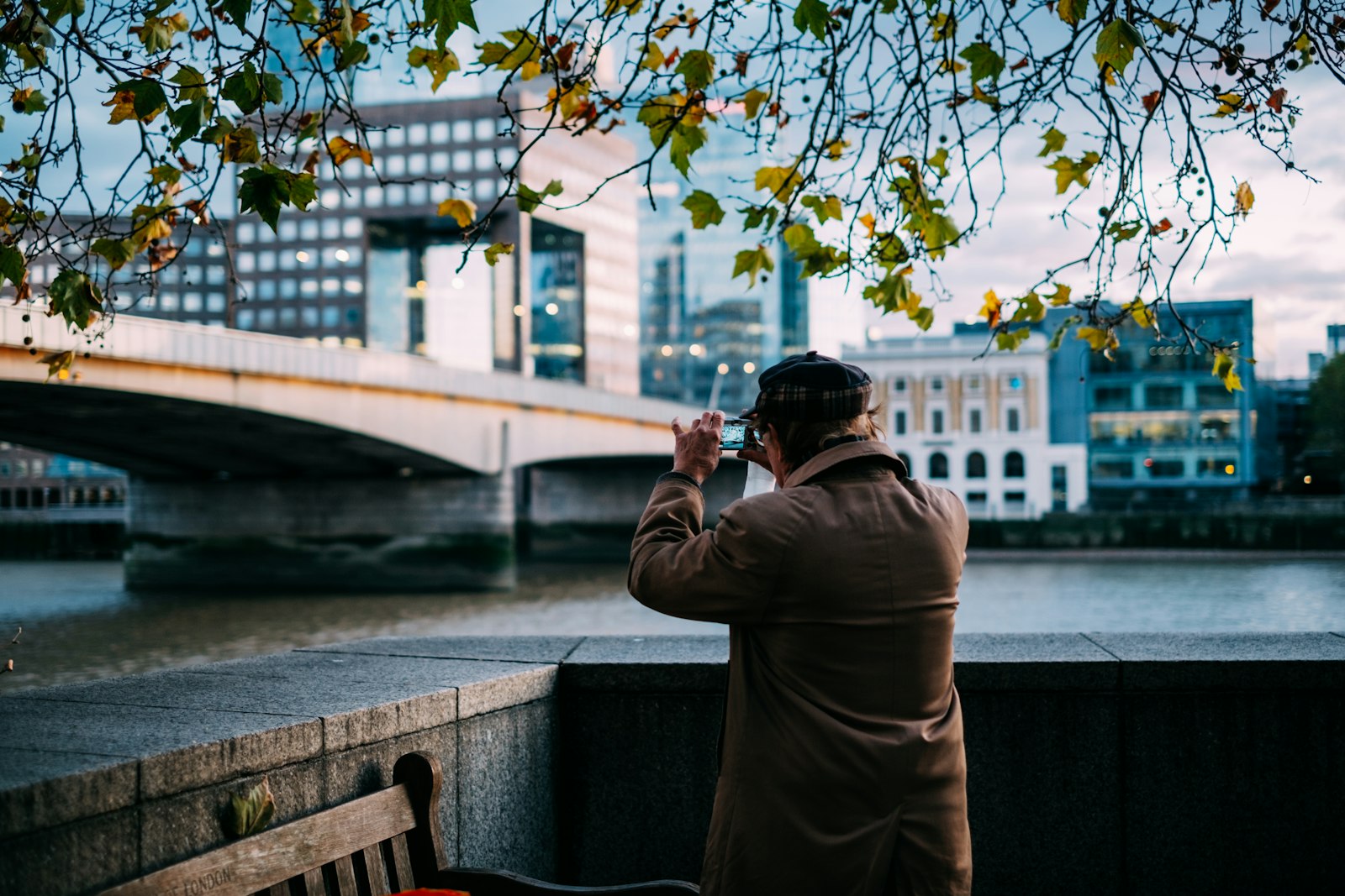 Fujifilm X-E2 + Fujifilm XF 35mm F1.4 R sample photo. Man standing beside river photography