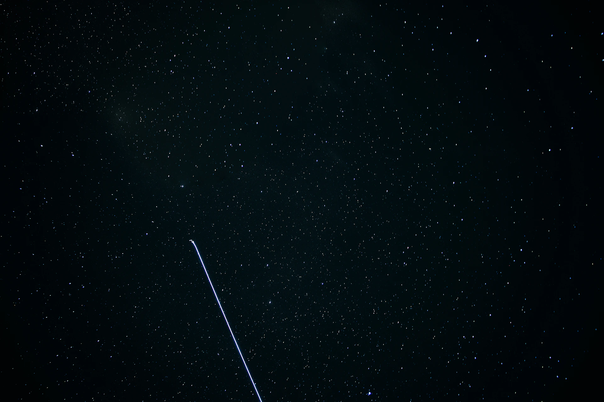 A starry space scene with a digital network grid overlay, symbolizing connectivity and innovation.
