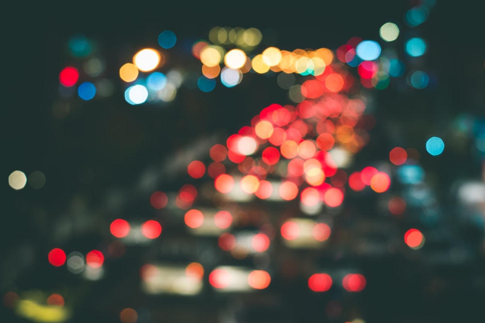 a blurry photo of a city street at night