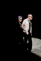 man walking along the street