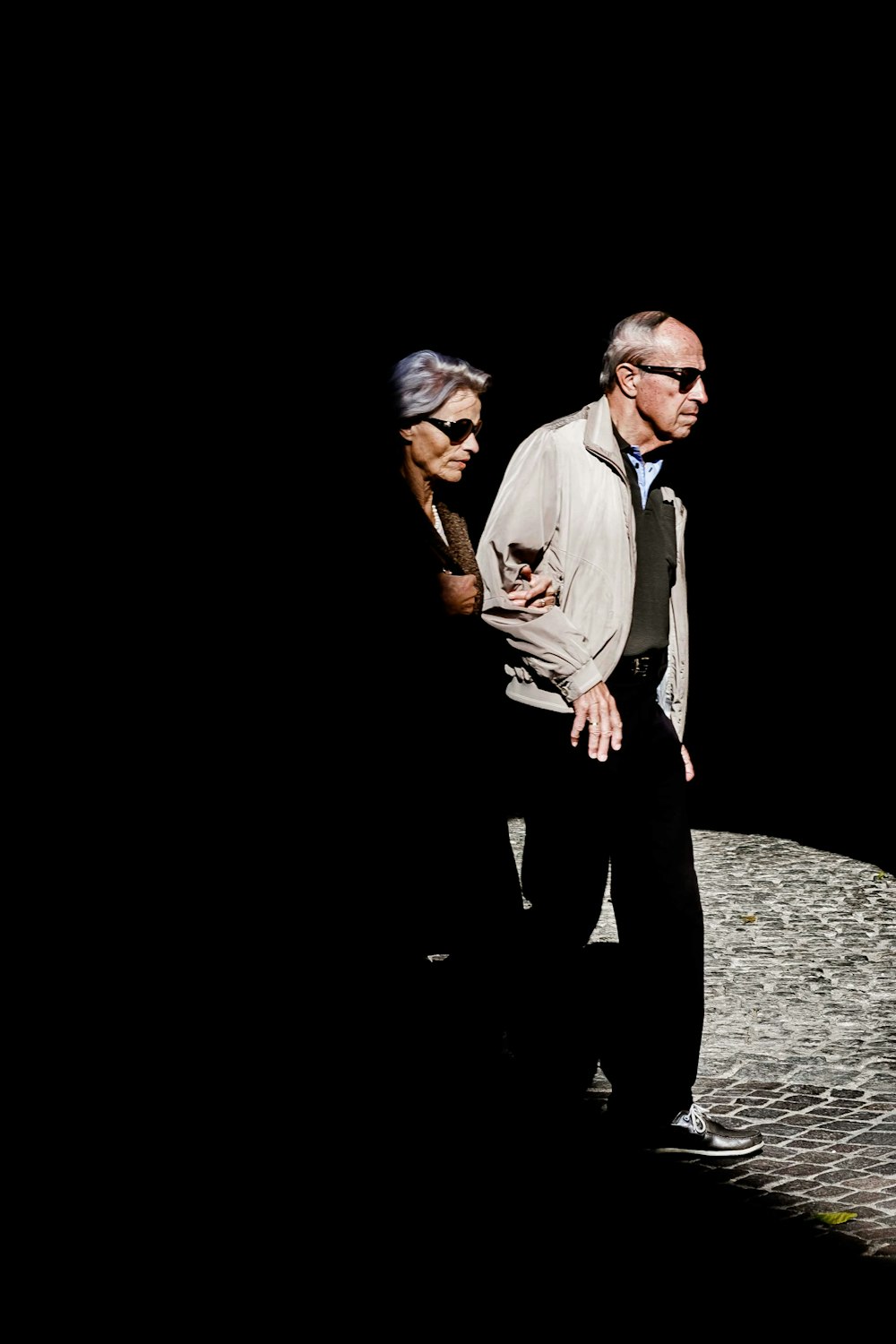 man walking along the street