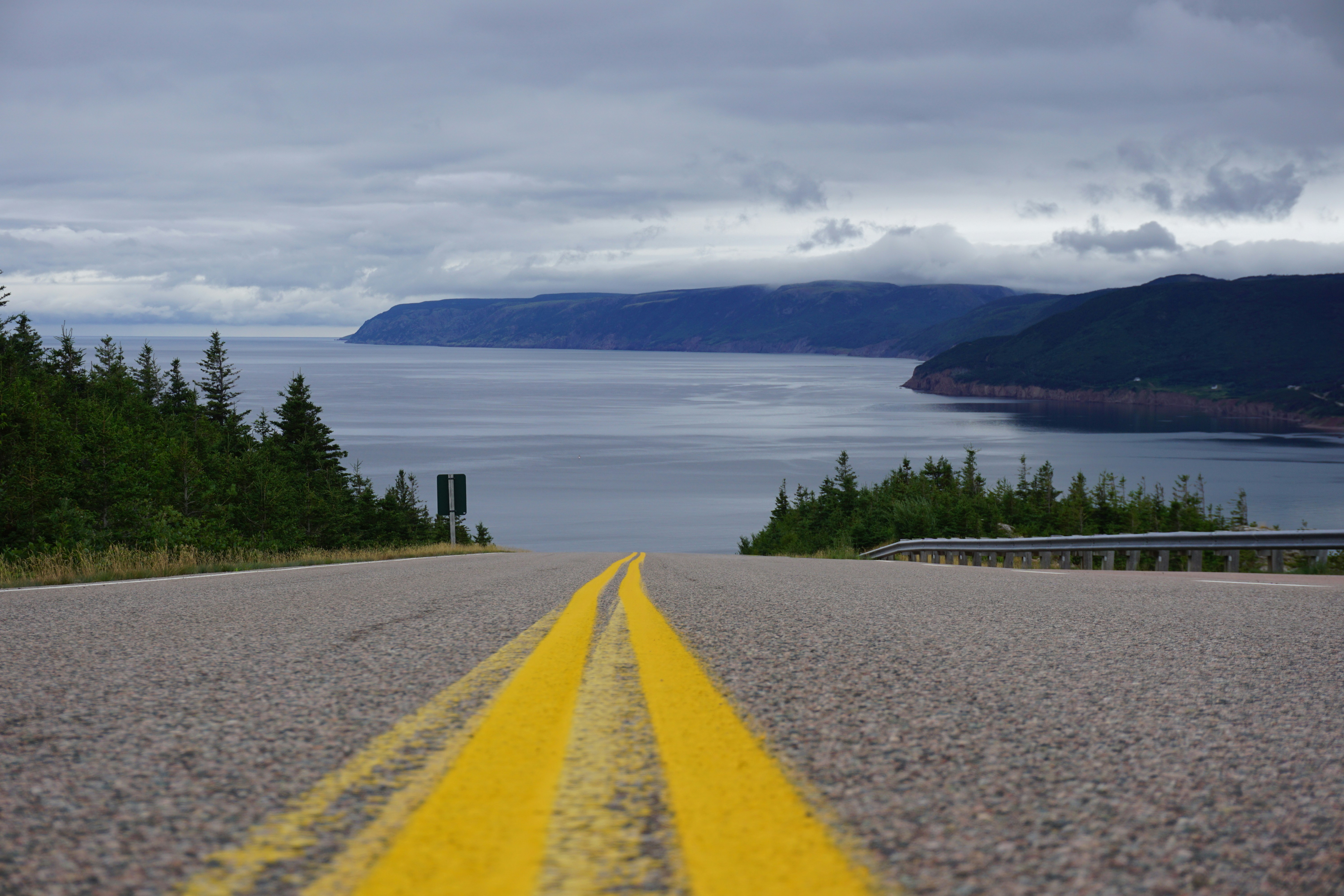 Last year, in 2016, we did a trip to Nova Scotia. I saw this, and I had to stop the car; run to the middle of the road and take this photo. I actually took a few, but this is my favourite. This is my favourite photo. And now, it is here for you. For free. (If you ever get a chance to drive the Cabot Trail, then you owe it to yourself to do so. We did it in the early morning, in August, and watched the clouds rise above the clouds. Highly recommended.)