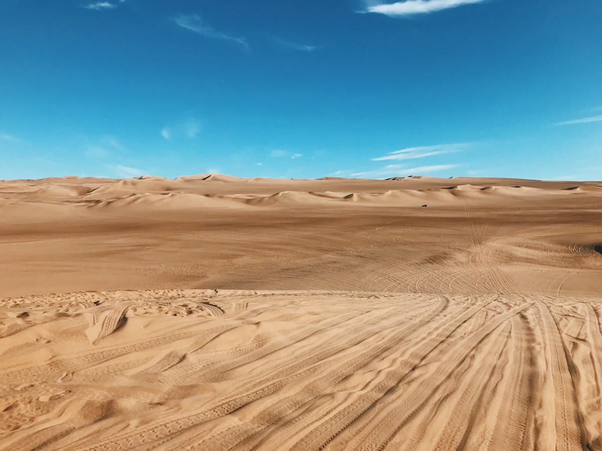 Vehicle tracks across the sand dunes at Huacachina, inland in the Ica desert