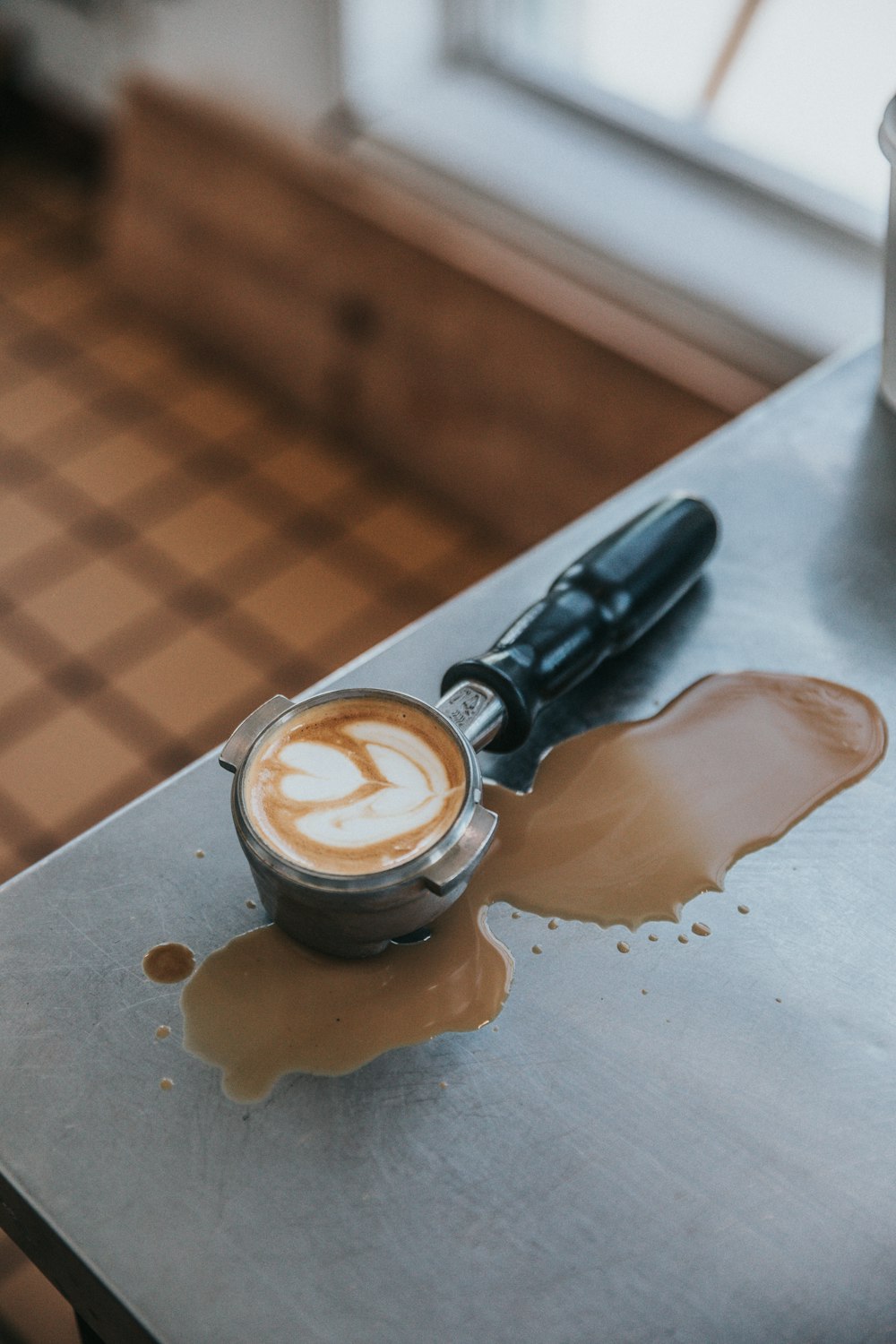 spilled latte on espresso handle