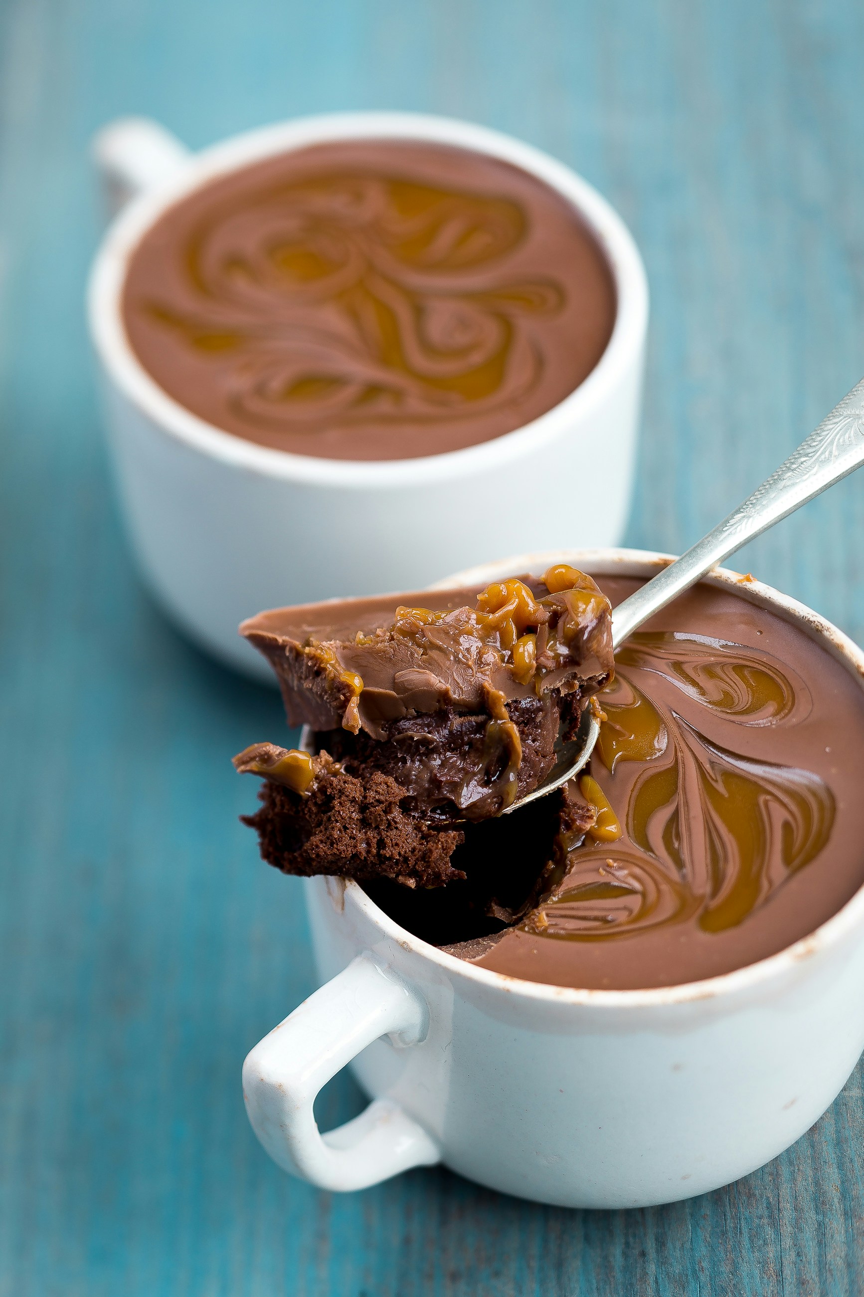 I picked up these very old French cups at an antique fair in Sussex while I was prop picking for a restaurant. I knew the moment I saw them I wanted to put something naughty in them and couldn’t wait to get cooking. It’s a dark chocolate mousse topped with milk choc ganache and swirls of salted caramel. They didn’t last long.