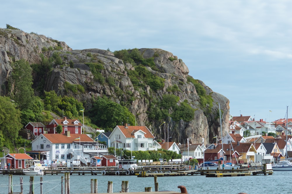 white buildings near body of water at daytime