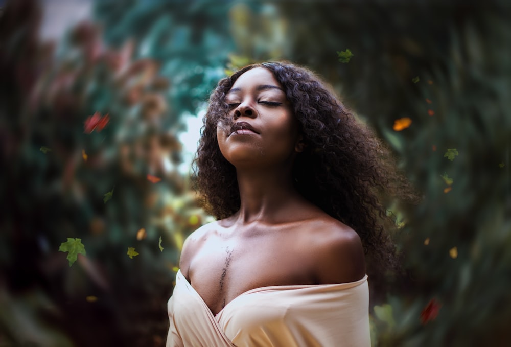 woman wearing beige off-shoulder top