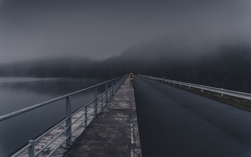 a road that is next to a body of water