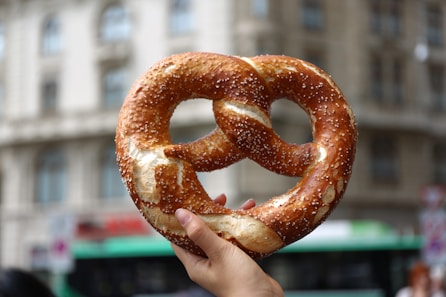 person holding pretzel