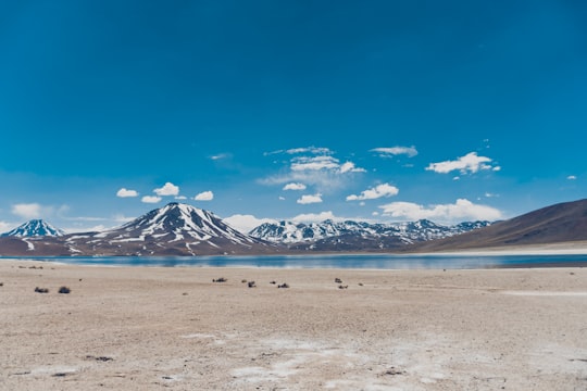 snow mountain near river in Uyuni Bolivia