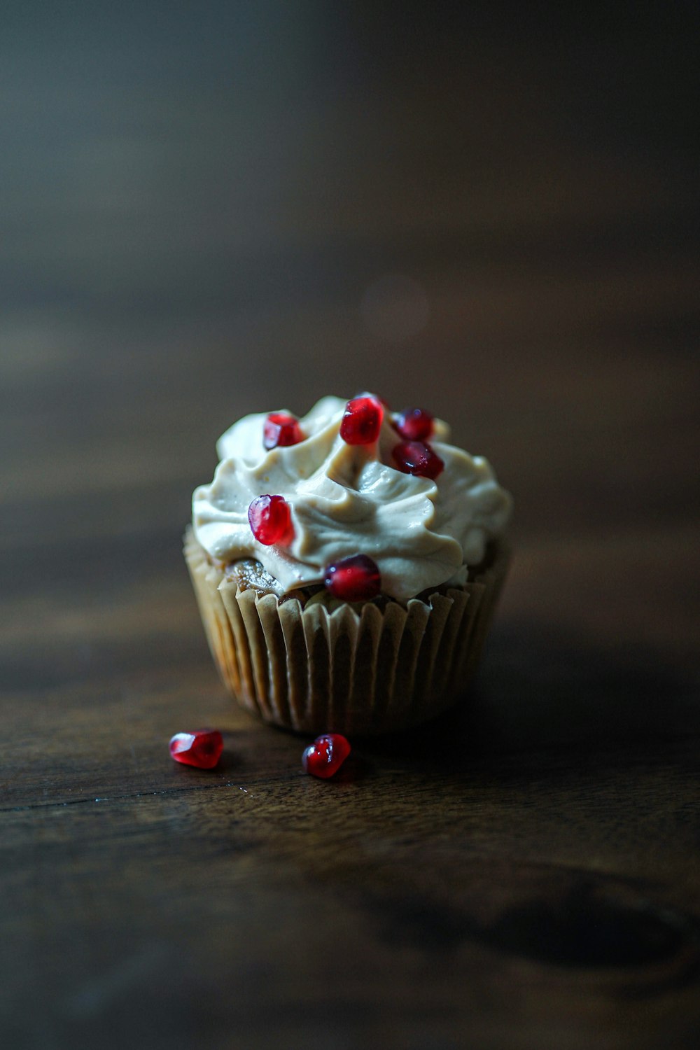 baked cupcake with white icing on top