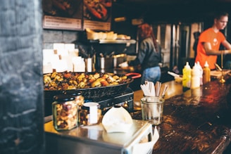 person in the kitchen cooking