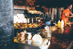 person in the kitchen cooking