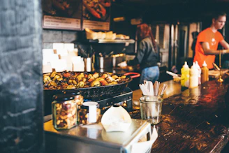 person in the kitchen cooking