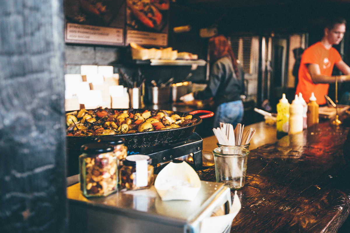 A chef working in a busy kitchen