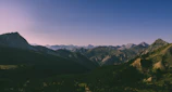 Wide shot of the Sierra Madre mountains under a clear blue sky, highlighting natural beauty.
