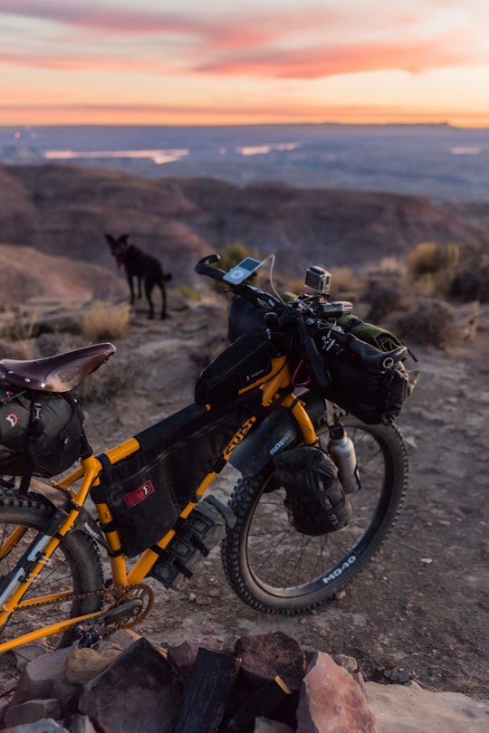 yellow bicycle on mountain in Grand Staircase-Escalante National Monument United States