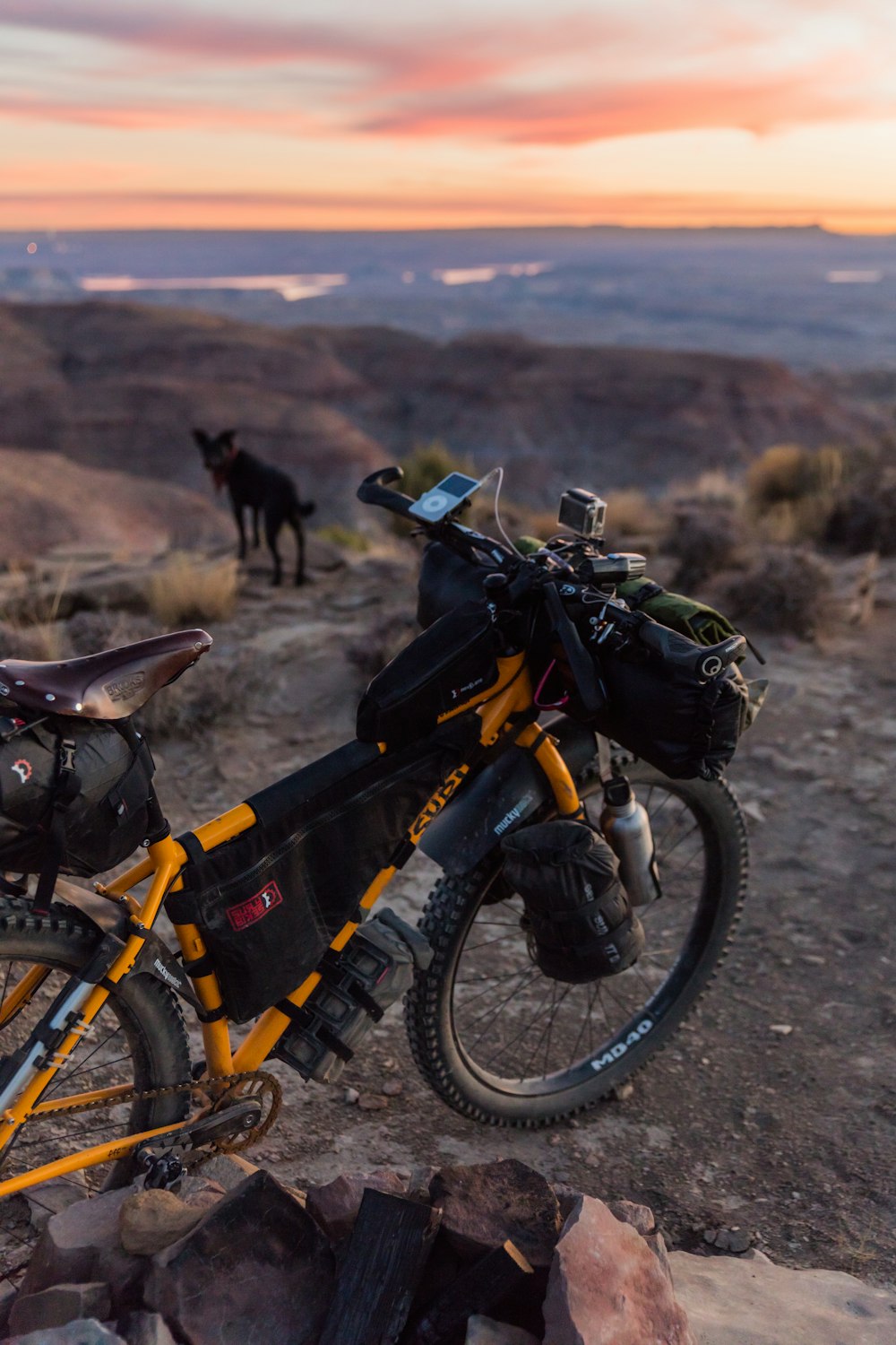 yellow bicycle on mountain