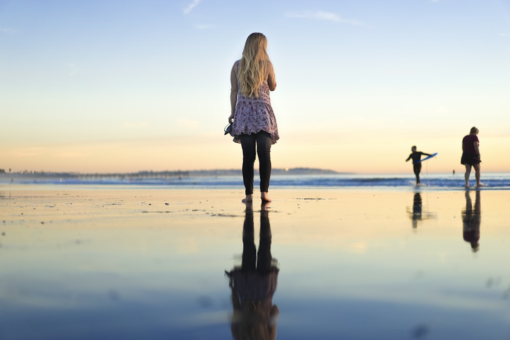 woman standing on beach