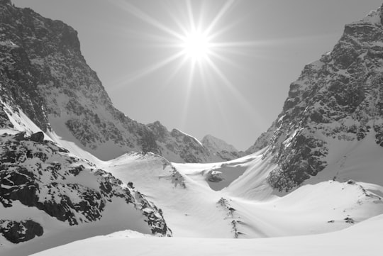 snow coated mountains during daytime in Lyngen Alps Norway