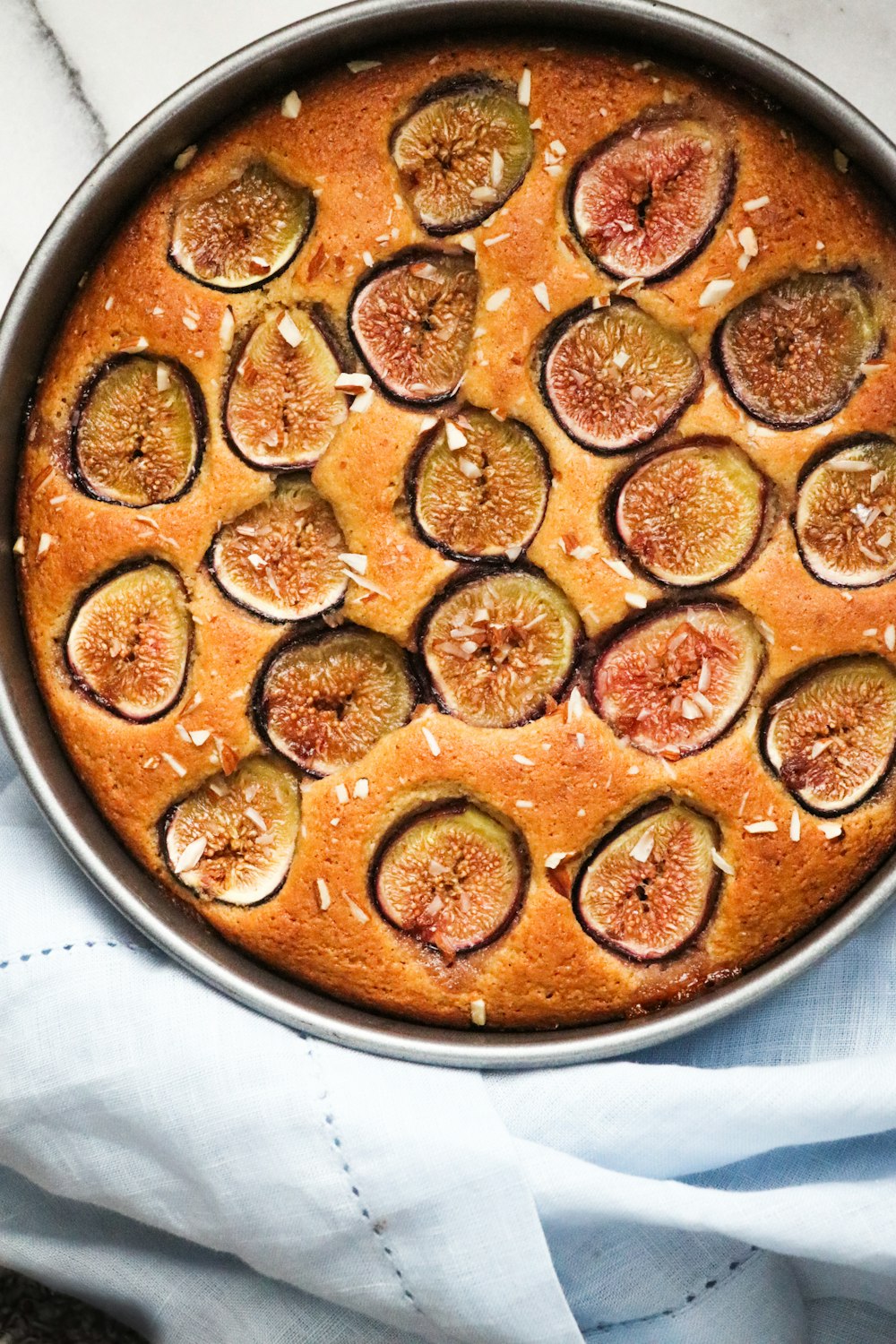 baked base cake on gray cake pan