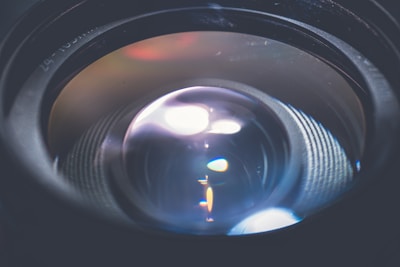 Close-up of finely polished optical glass elements displaying clarity and precision.