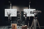 black video and DSLR cameras with tripods