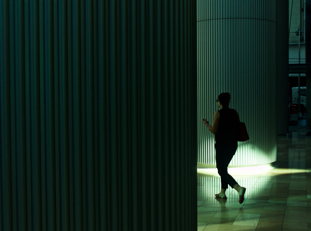 person walking in mall