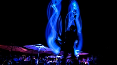 A dynamic view of an outdoor event illuminated by LED panels.